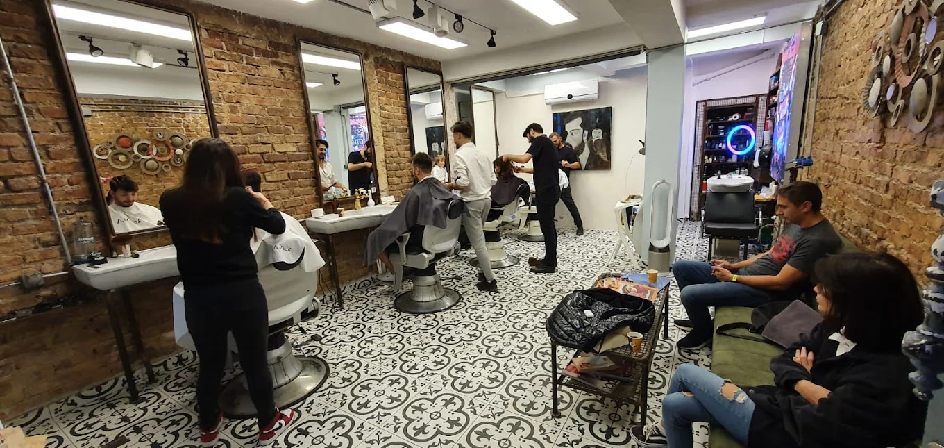 2.a. berber barbershop man-women